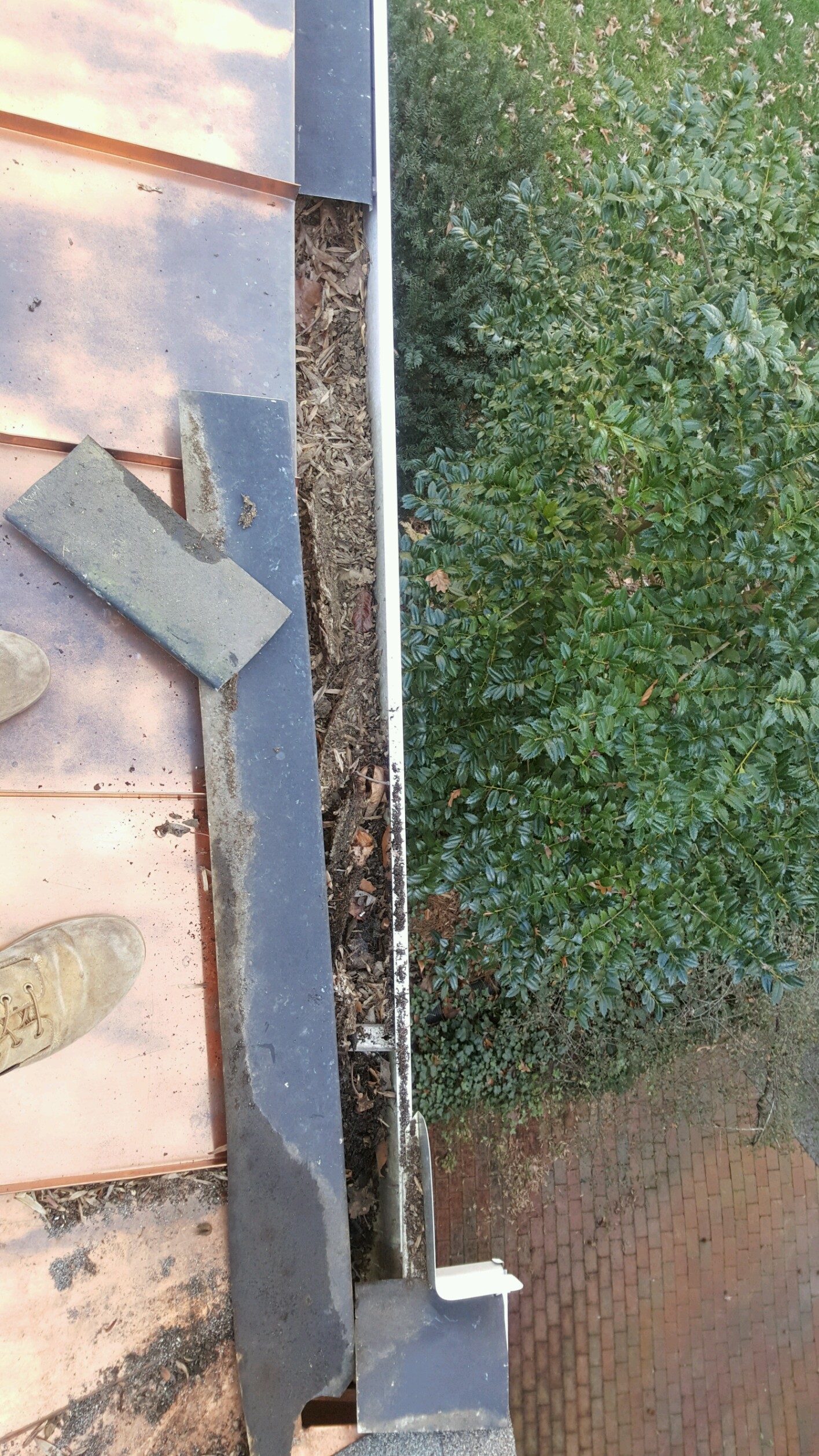 Failed gutter guard removed
